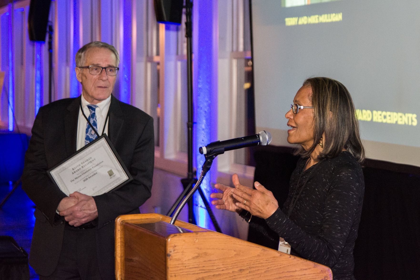 Keith Shahan award recipient Terry Mulligan speaks to a crowded room